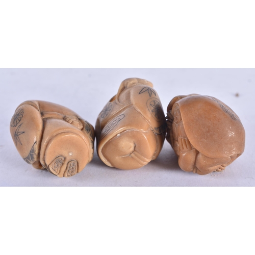 1351 - Three Japanese Nut Netsuke carved as Figures.  Largest 3.4cm x 1.9cm x 2.8 cm, total weight 36g (3)