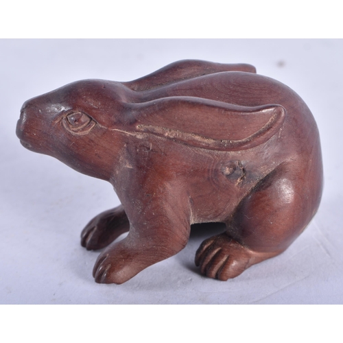 1354 - A Japanese Carved Rabbit Netsuke.  6.1cm x 3.6 cm x 3.3 cm, weight 28.6g