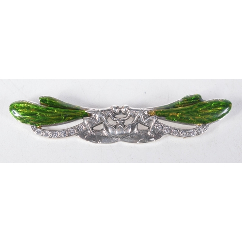 1357 - A Silver and Green Enamel Dragonfly Brooch.  Stamped Sterling, 6.6 cm x 1.4cm, weight 10.81g