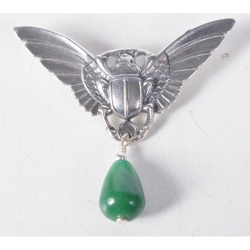 1358 - A Silver Winged Beetle Brooch with a Jade Droplet.  Stamped Sterling.  5 cm x 4cm, weight 11.8g