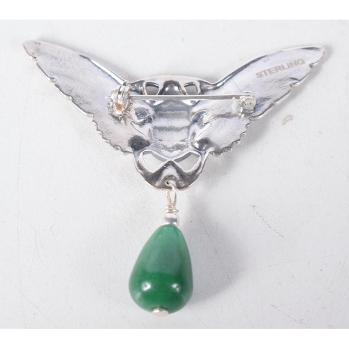 1358 - A Silver Winged Beetle Brooch with a Jade Droplet.  Stamped Sterling.  5 cm x 4cm, weight 11.8g