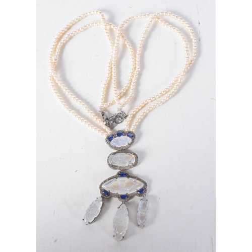 1366 - A Double Strand Pearl Necklace with a Moonstone, Sapphire and Diamond Pendant.  Length 45cm, weight ... 