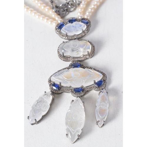 1366 - A Double Strand Pearl Necklace with a Moonstone, Sapphire and Diamond Pendant.  Length 45cm, weight ... 