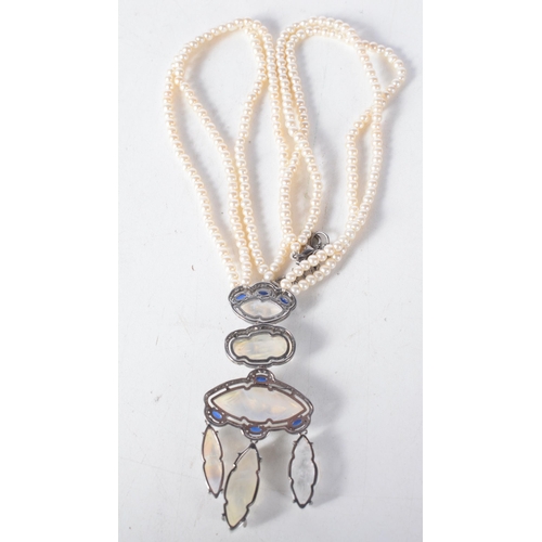 1366 - A Double Strand Pearl Necklace with a Moonstone, Sapphire and Diamond Pendant.  Length 45cm, weight ... 