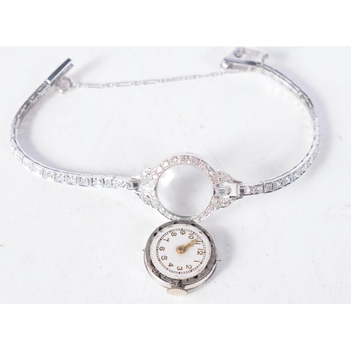 1370 - A Platinum Ladies Cocktail Watch set with diamonds.  Stamped 10% IDID.PLAT.  Length 13.5 cm, Dial 1.... 