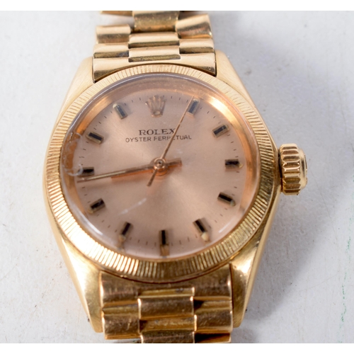 1376 - An 18 Carat Gold Ladies Rolex Oyster Perpetual Watch.  Stamped 750,  2.7cm dial incl crown, Running,... 