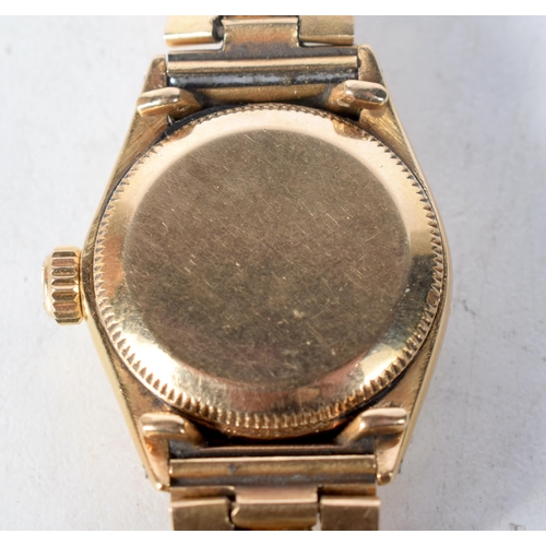 1376 - An 18 Carat Gold Ladies Rolex Oyster Perpetual Watch.  Stamped 750,  2.7cm dial incl crown, Running,... 