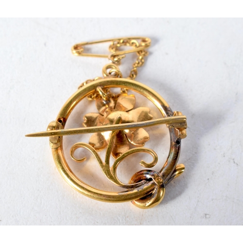 1378 - A 15 Carat Gold Flower Brooch set with Pearls with Safety Chain.  Stamped 15 CT.  2.1cm diameter, we... 