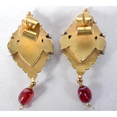 1379 - A Pair of Antique Gold Earrings set with Mughal Cut Diamonds and Gemstones.  4cm x 1.7cm, total weig... 