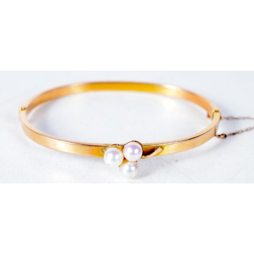 1382 - An Antique 15 Carat Gold Bangle set with 3 Pearls.  Stamped 15CT, 4.8 cm x 5.7cm, weight 6.6g