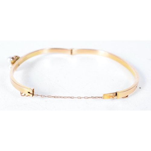 1382 - An Antique 15 Carat Gold Bangle set with 3 Pearls.  Stamped 15CT, 4.8 cm x 5.7cm, weight 6.6g