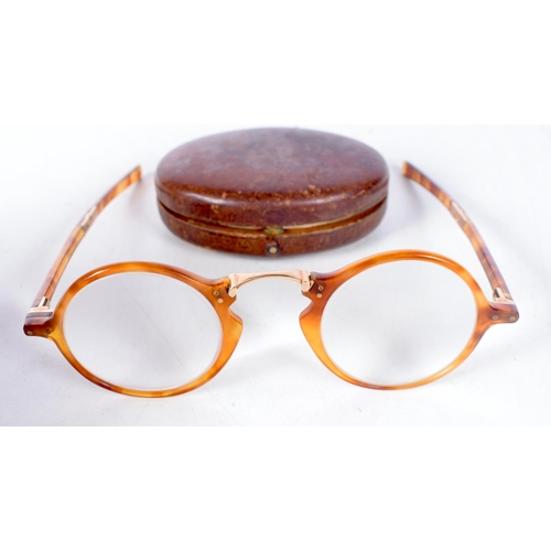 1386 - A Cased Pair of Antique Folding Spectacles with Tortoiseshell Rims and Yellow Metal Fittings.  12.5 ... 