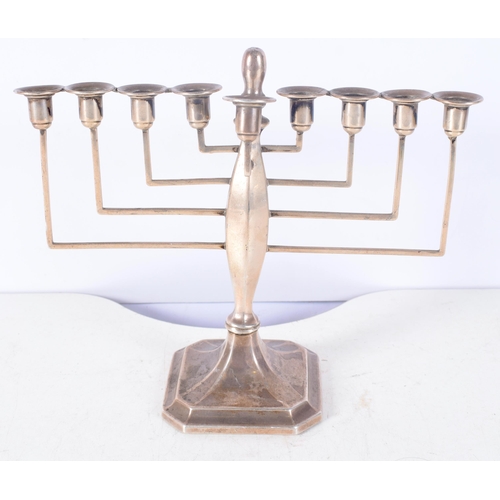 1390 - A Silver Menorah by Britton, Gould & Co.  Hallmarked Birmingham 1936.  20 cm x 21cm x 9cm, weight 41... 