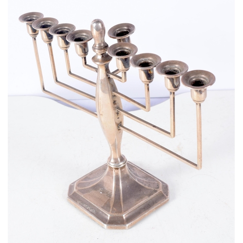 1390 - A Silver Menorah by Britton, Gould & Co.  Hallmarked Birmingham 1936.  20 cm x 21cm x 9cm, weight 41... 