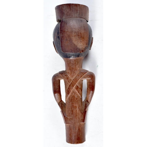 1398 - A Tribal African Walking Cane / Stick Handle Top carved as a Tribal Figure.  14.8 cm x 5 cm, weight ... 