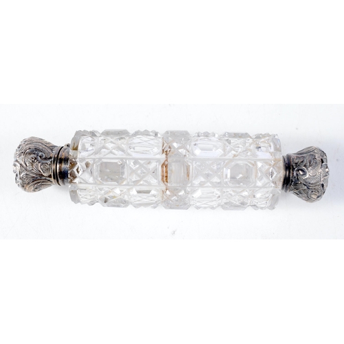 1402 - A Double Ended Glass Scent Bottle with White Metal Mounts.  12cm x 3 cm, weight 90g