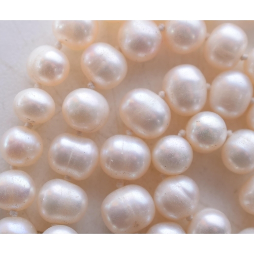 1404 - A Pearl Necklace.  Bead Size 7mm, Length 132cm, weight 97g