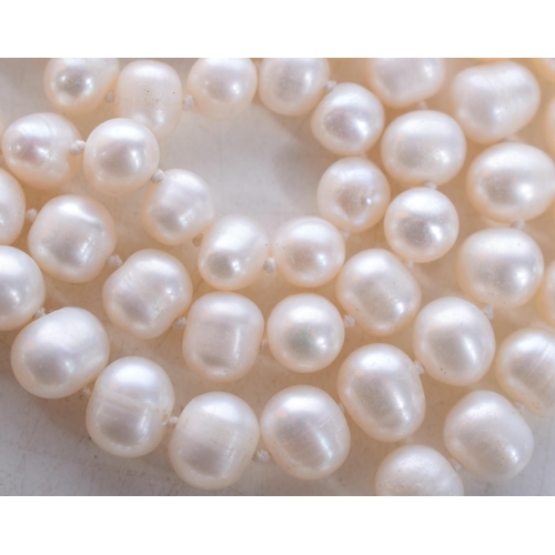 1404 - A Pearl Necklace.  Bead Size 7mm, Length 132cm, weight 97g