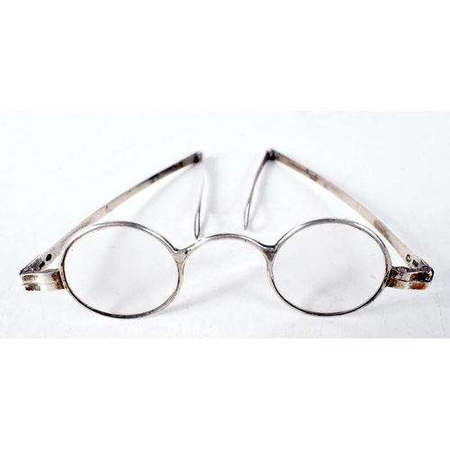 1409 - A Pair of Georgian Silver Framed  Folding Wig Spectacles.  Hallmarked Birmingham.  10.6 cm wide, wei... 