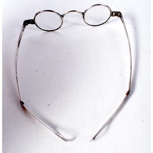 1409 - A Pair of Georgian Silver Framed  Folding Wig Spectacles.  Hallmarked Birmingham.  10.6 cm wide, wei... 