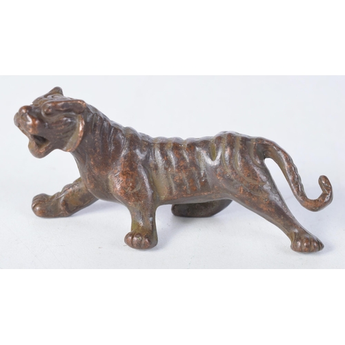 1411 - A Japanese Bronze Tiger.  7.3 cm x 3.4cm x 2.6 cm, weight 94g