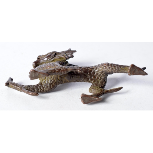 1414 - A Japanese Bronze Dragon.  10.7cm x 7.1cm x 2.2 cm, weight 158.6g