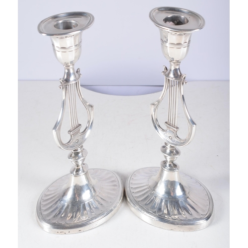 1415 - A Pair of Victorian Silver Lyre Candlesticks (with weighted bottoms)  by Hawksworth, Eyre & Co Ltd. ... 