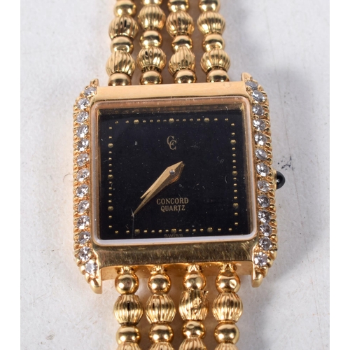 1434 - Concord Solid 14K Gold Swiss Quartz Ladies Watch set with Diamonds.  Stamped 750 / 18K, Dial 2 cm in... 