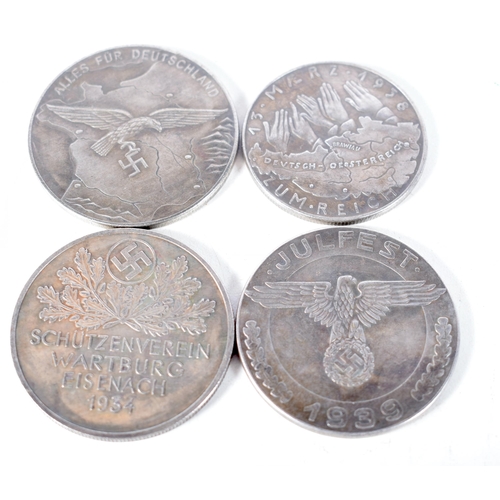 1436 - Four German Pre World War 2 Medallions.  Largest 4.1cm diameter, total weight 92.2g (4)