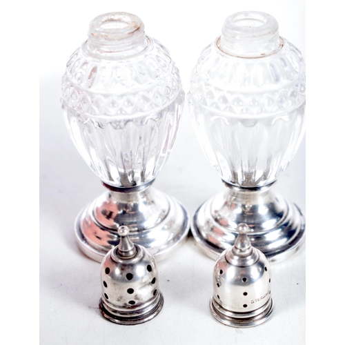 1446 - Two Glass Condiments with Silver Mounts.  Stamped Sterling.  9.5 cm x 3.6 cm, Weighted bases