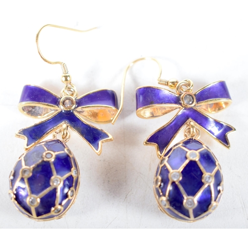 1461 - A Pair of Continental Silver Gilt and Enamel Earrings.  4.8 cm x 2.3 cm x 1.2 cm, weight 18.2g