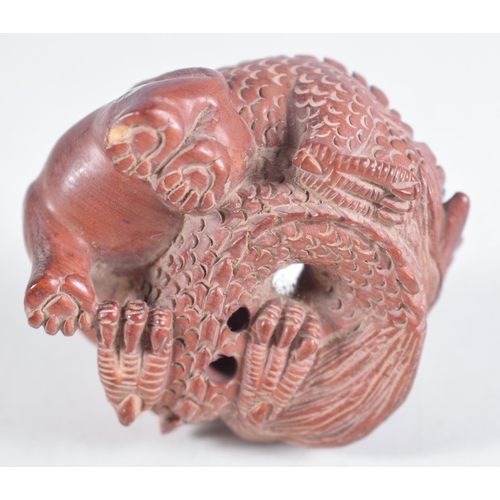 1474 - A Carved Hardwood Dragon Netsuke.  3.1cm x 6 cm x 5.2 cm, weight 38.6g