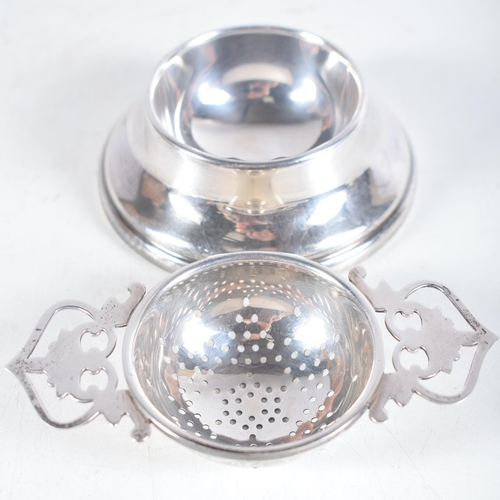 1481 - A Vintage Silver Tea Strainer on Stand by Lanson Ltd.  Hallmarked Birmingham 1959.  3 cm x 10.5 cm x... 