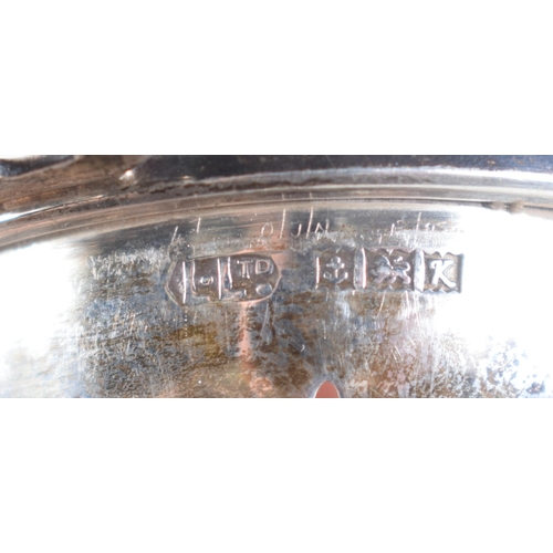 1481 - A Vintage Silver Tea Strainer on Stand by Lanson Ltd.  Hallmarked Birmingham 1959.  3 cm x 10.5 cm x... 