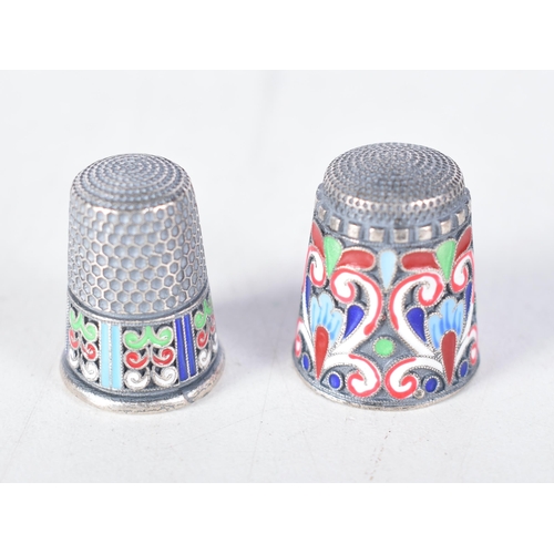 1485 - Two Continental Silver and Enamel Thimbles.  Stamped 84, 2.3 cm x 1.8 cm, total weight 20g (2)