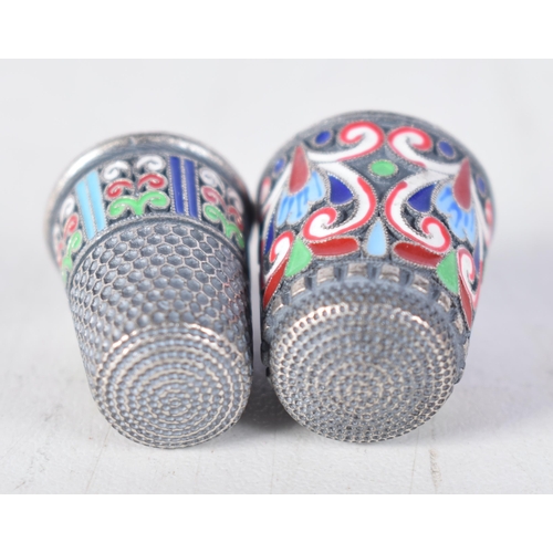 1485 - Two Continental Silver and Enamel Thimbles.  Stamped 84, 2.3 cm x 1.8 cm, total weight 20g (2)