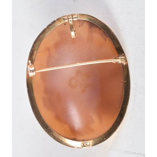 1493 - A Victorian 18 Carat Gold Mounted Cameo Brooch.  Stamped 750.  3.7cm x 2.9cm, weight 6.2g