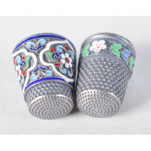 1501 - Two Continental Silver and Enamel Thimbles. 2.2 cm x 1.7cm, total weight 21g (2)