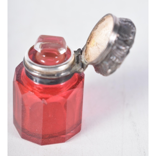 1503 - An Edwardian Cranberry Glass Scent Bottle with Silver Top.  Hallmarked Birmingham 1903.  4.1cm x 2.5... 