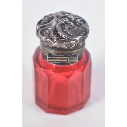 1503 - An Edwardian Cranberry Glass Scent Bottle with Silver Top.  Hallmarked Birmingham 1903.  4.1cm x 2.5... 