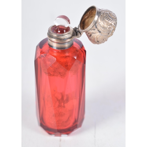 1506 - A Victorian Cranberry Glass Scent Bottle with Silver Top.  Hallmarked Birmingham 1876.  7.3 cm x 2.6... 