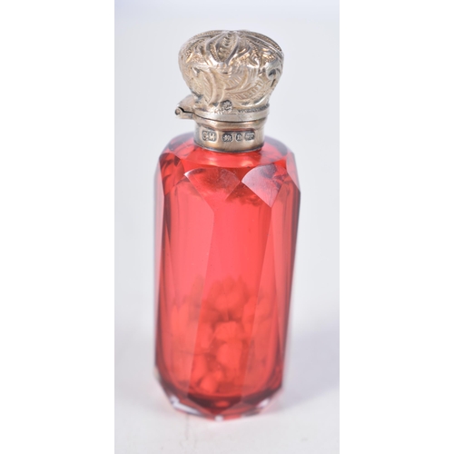 1506 - A Victorian Cranberry Glass Scent Bottle with Silver Top.  Hallmarked Birmingham 1876.  7.3 cm x 2.6... 