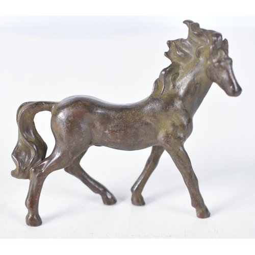 1511 - A Japanese Bronze Model of a Horse.  8 cm x 8.5 cm x 2.5 cm, weight 180g