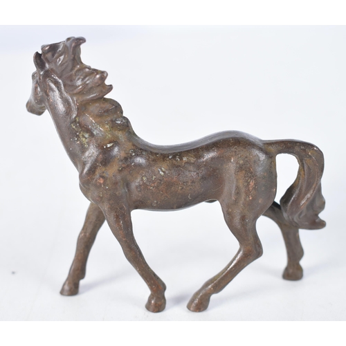 1511 - A Japanese Bronze Model of a Horse.  8 cm x 8.5 cm x 2.5 cm, weight 180g