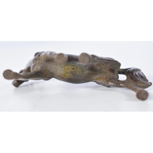 1511 - A Japanese Bronze Model of a Horse.  8 cm x 8.5 cm x 2.5 cm, weight 180g