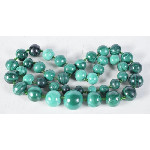 1512 - A Malachite Bead Necklace.  Length 69cm, largest bead 19mm, weight 221g