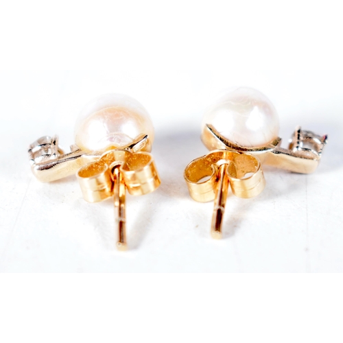 1566 - A Cased Pair of Diamond and Pearl Earrings.  1.1cm x 0.7cm, weight 2.1g