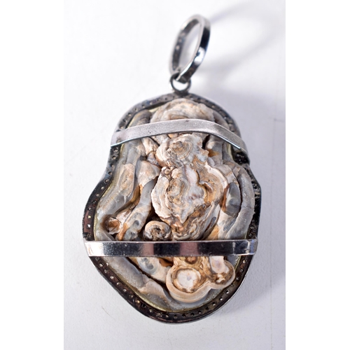 1570 - A Stone Pendant with Diamond Surround.  6.8 cm x 3.7cm, weight 24g