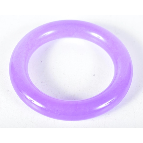 1571 - A Lavender Jade Bangle.  6 cm internal diameter, weight 89g