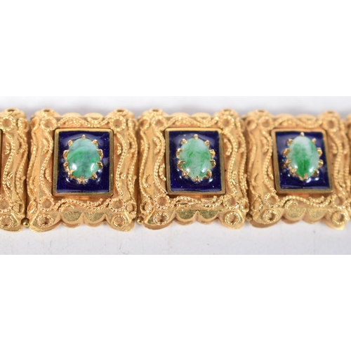 1578 - A 14 Carat Gold Panel Bracelet set with Jade Cabochons.  Stamped 14K, 16.5 cm x 2.1cm, weight 60.4g